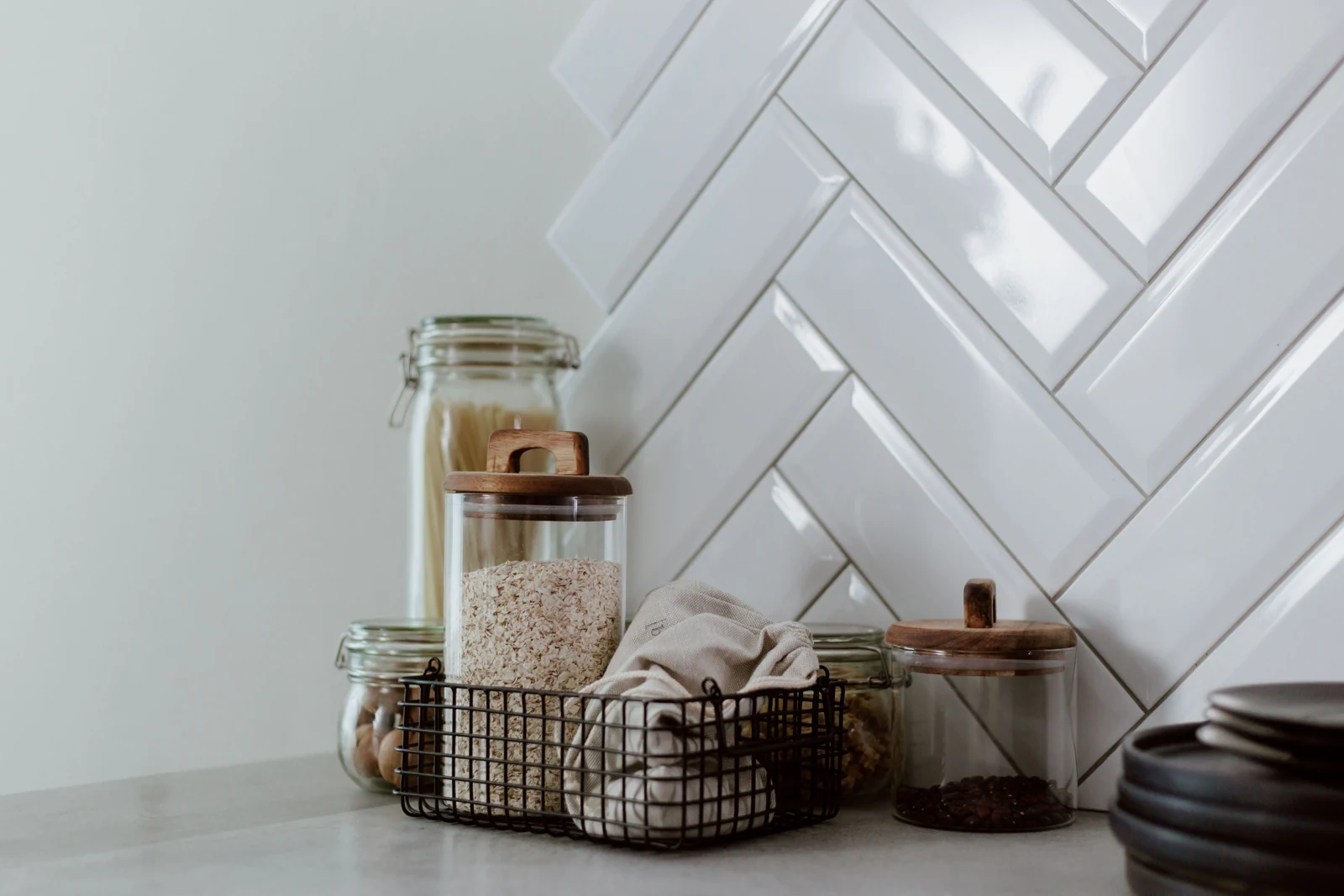 Modern kitchen pantry with premium glass jars and ingredients